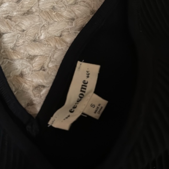 Black ribbed tank top
-size small
-never been worn
-fits like a medium - Picture 2 of 4